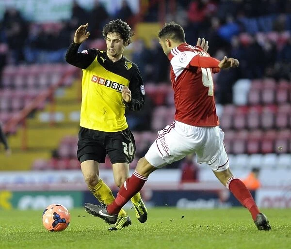 Bristol City vs. Watford: Intense Clash between Liam Fontaine and Diego Fabbrini at Ashton Gate - FA Cup Third Round