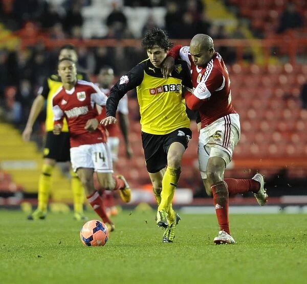 Bristol City vs. Watford: Marvin Elliott and Diego Fabbrini Battle for the Ball in FA Cup Third Round at Ashton Gate