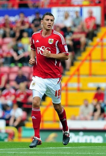 Bristol City vs West Brom: James Wilson in Action - Championship Football Match, 2011