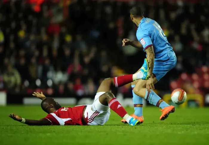 Framed Print : Bristol City vs. West Ham: Andre Amougou vs. John Carew Battle for Possession at Ashton Gate Stadium (17-04-2012) Framed Print : Bristol City vs. West Ham: Andre Amougou vs. John Carew Battle for Possession at Ashton Gate Stadium (17-04-2012)