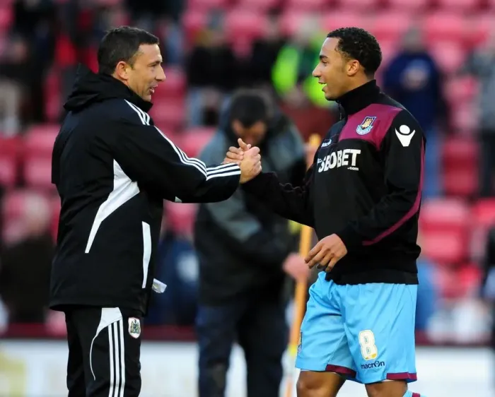 Framed Print : Bristol City vs. West Ham: Derek McInnes and Nicky Maynard Embrace Post-Match at Ashton Gate Stadium Framed Print : Bristol City vs. West Ham: Derek McInnes and Nicky Maynard Embrace Post-Match at Ashton Gate Stadium