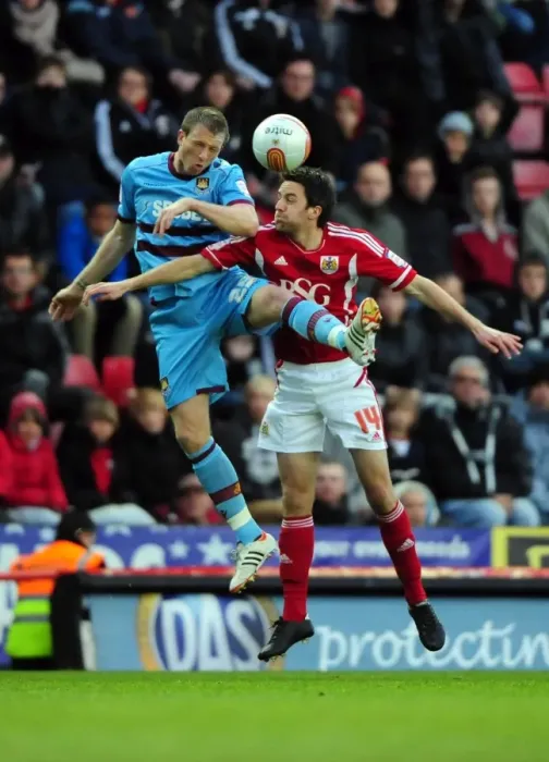 Framed Print : Bristol City vs. West Ham: A High Stakes Aerial Battle - Skuse vs. Collins Framed Print : Bristol City vs. West Ham: A High Stakes Aerial Battle - Skuse vs. Collins