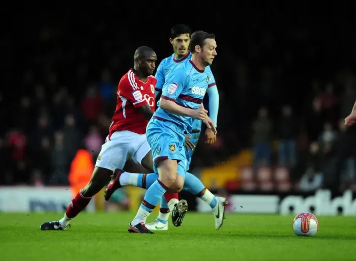 Framed Print : Bristol City vs. West Ham: Intense Battle Between Kalifa Cisse and Kevin Nolan Framed Print : Bristol City vs. West Ham: Intense Battle Between Kalifa Cisse and Kevin Nolan