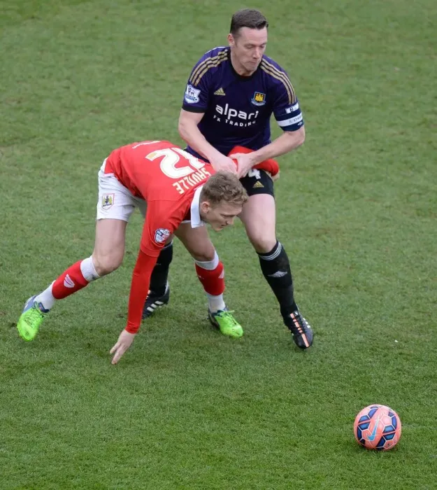 Framed Print : Bristol City vs West Ham: Nolan Fouls Saville in FA Cup Clash Framed Print : Bristol City vs West Ham: Nolan Fouls Saville in FA Cup Clash