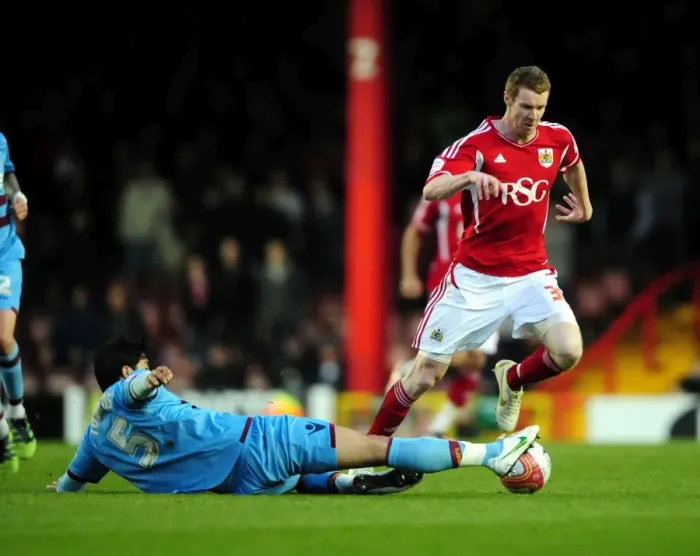 Framed Print : Bristol City vs. West Ham: Pearson vs. Tomkins Tackle Battle Framed Print : Bristol City vs. West Ham: Pearson vs. Tomkins Tackle Battle