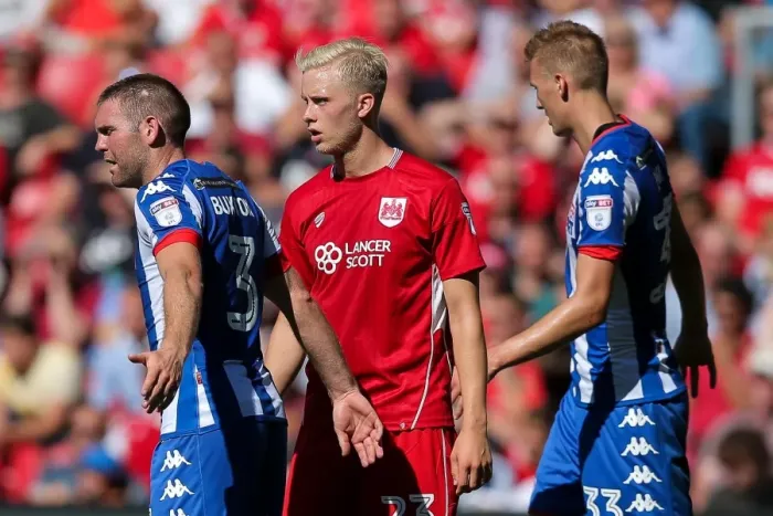 Framed Print : Bristol City vs Wigan Athletic: Hordur Magnusson's Intense Focus at Ashton Gate Stadium Framed Print : Bristol City vs Wigan Athletic: Hordur Magnusson's Intense Focus at Ashton Gate Stadium