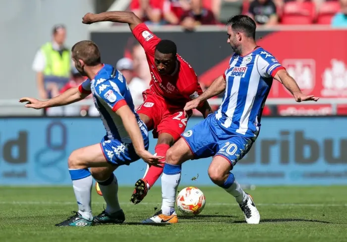 Framed Print : Bristol City vs Wigan Athletic: Kodjia vs Buxton and Morgan - Intense Face-off