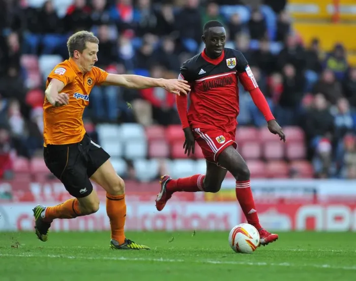 Framed Print : Bristol City vs. Wolverhampton Wanderers: Albert Adomah vs. Christophe Berra Battle for Possession in Championship Match, December 2012 Framed Print : Bristol City vs. Wolverhampton Wanderers: Albert Adomah vs. Christophe Berra Battle for Possession in Championship Match, December 2012