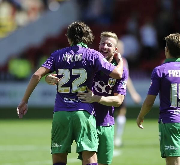 Bristol City: Wade Elliott and Luke Ayling's Jubilant Moment as They Celebrate Goal in Sky Bet League One Opener Against Sheffield United (09 / 08 / 2014)