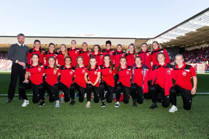 Framed Print : Bristol City Women at Half Time: Manager Willie Kirk Leads the Team against Barnsley at Ashton Gate Stadium