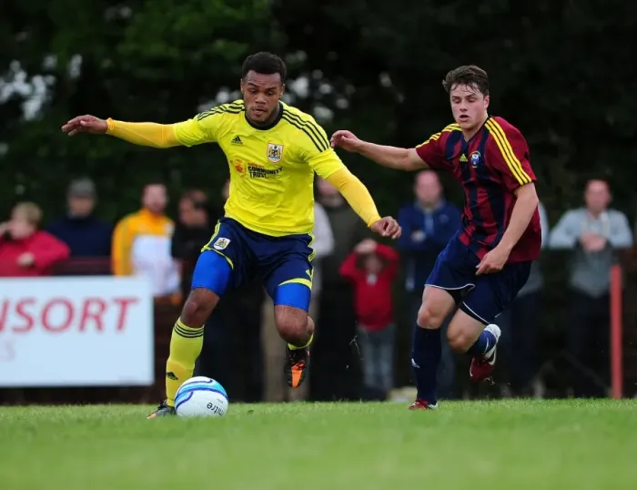 Framed Print : Bristol City's Aaron Amadi-Holloway Escapes Defender in Pre-Season Friendly vs Ashton and Backwell United Framed Print : Bristol City's Aaron Amadi-Holloway Escapes Defender in Pre-Season Friendly vs Ashton and Backwell United