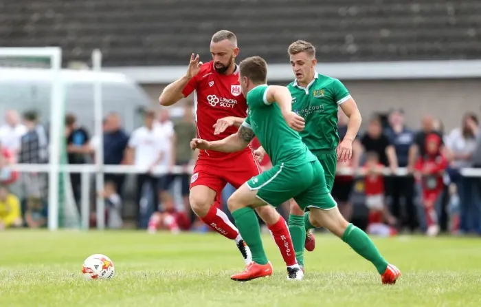 Framed Print : Bristol City's Aaron Wilbraham Battles Defenders in Pre-Season Friendly Against Hengrove Athletic Framed Print : Bristol City's Aaron Wilbraham Battles Defenders in Pre-Season Friendly Against Hengrove Athletic