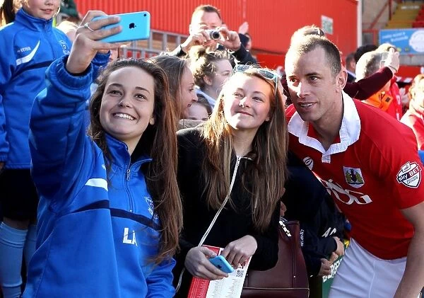 Bristol City's Aaron Wilbraham Celebrates with Fans after Win against Coventry City, 18th April 2015