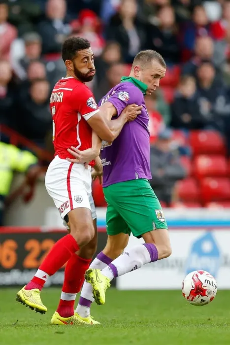Framed Print : Bristol City's Aaron Wilbraham Faces Off Against Barnsley's Lewin Nyatanga in Sky Bet League 1 Clash Framed Print : Bristol City's Aaron Wilbraham Faces Off Against Barnsley's Lewin Nyatanga in Sky Bet League 1 Clash