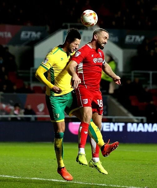 Bristol City's Aaron Wilbraham Outjumps Norwich City's Mitchell Dijks for a Header at Ashton Gate, 07-03-2017