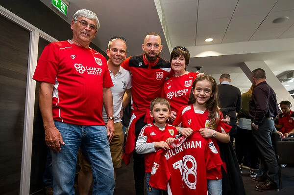 Bristol City's Aaron Wilbraham Presents Sponsors with Signed Shirt after Championship Match vs. Birmingham City