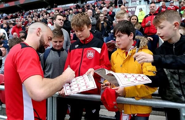 Bristol City's Aaron Wilbraham Signs Autographs for Fans During Bristol City v Queens Park Rangers Match