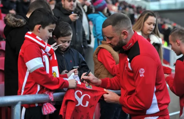 Framed Print : Bristol City's Aaron Wilbraham Signs Fan's Shirt during Bristol City v Cardiff City Match, Sky Bet Championship (January 14, 2017)