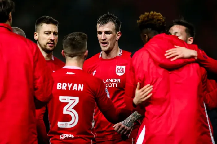 Framed Print : Bristol City's Aden Flint Celebrates 4-0 Win Over Huddersfield Town, Lifting Them out of the Relegation Zone