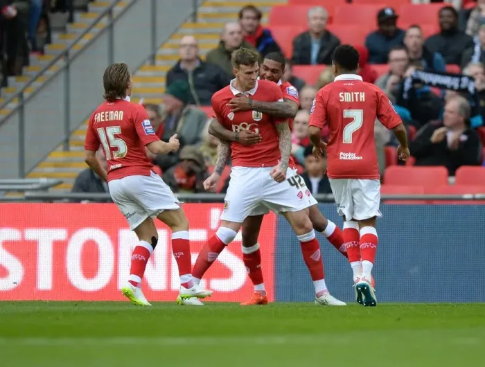Framed Print : Bristol City's Aden Flint Celebrates Johnstone's Paint Trophy Victory over Walsall