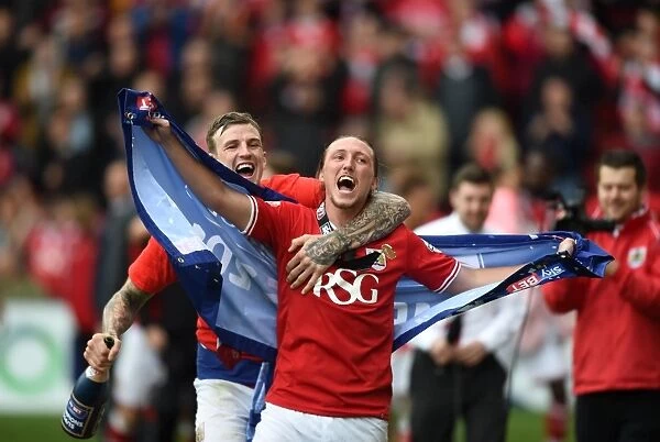 Bristol City's Aden Flint and Luke Ayling Celebrate Victory at Ashton Gate Stadium