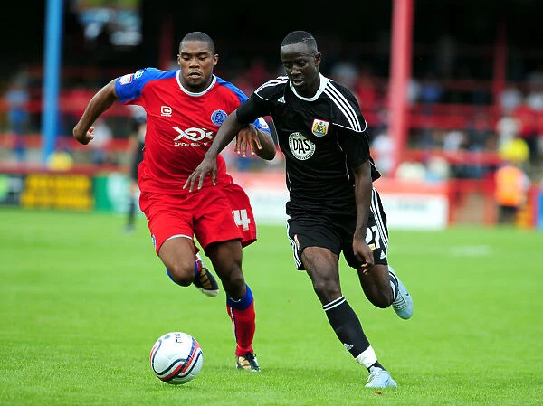 Bristol Citys Albert Adomah battles for the ball with Aldershots Manny Panther