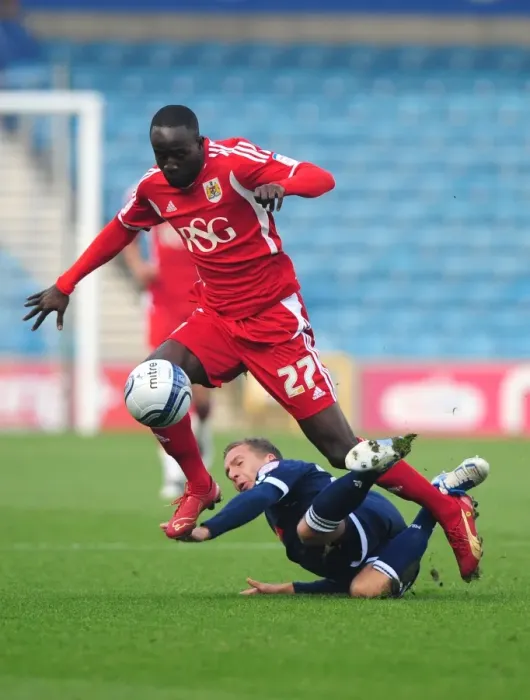Framed Print : Bristol City's Albert Adomah Dodges Brian Howard's Challenge: Millwall vs. Bristol City, Championship 2011 (Editorial Use Only) Framed Print : Bristol City's Albert Adomah Dodges Brian Howard's Challenge: Millwall vs. Bristol City, Championship 2011 (Editorial Use Only)
