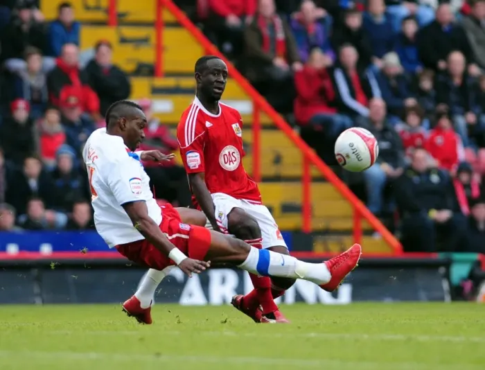 Framed Print : Bristol City's Albert Adomah Fouled by Crystal Palace's Claude Davis in Championship Match