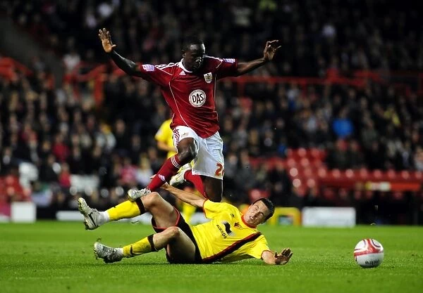 Bristol City's Albert Adomah Fouled by Don Cowie in Championship Match against Watford (14.09.2010)
