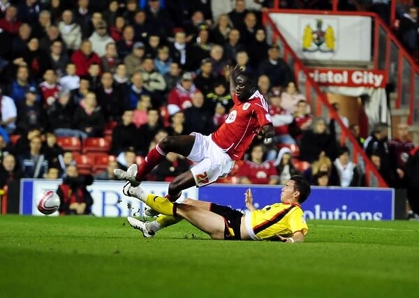Bristol City's Albert Adomah Fouled by Jordan Mutch in Championship Match against Watford (14 / 09 / 2010)