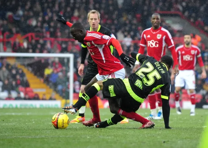 Framed Print : Bristol City's Albert Adomah Fouled by Leeds Fabian Delph during Championship Match