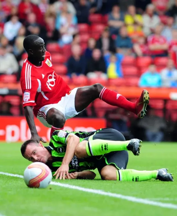 Framed Print : Bristol City's Albert Adomah Fouls by Marcos Painter in Championship Match vs. Brighton (10-09-2011) Framed Print : Bristol City's Albert Adomah Fouls by Marcos Painter in Championship Match vs. Brighton (10-09-2011)