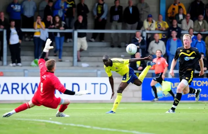 Framed Print : Bristol Citys Albert Adomah lifts the ball over the keeper but his effort is cleared off the line