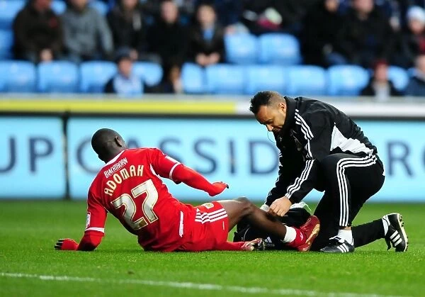 Bristol City's Albert Adomah Receives Penalty Area Treatment in Coventry City vs. Bristol City Championship Match (December 2011)