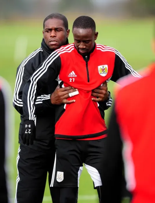 Framed Print : Bristol City's Albert Adomah Receives Treatment During Training Session Framed Print : Bristol City's Albert Adomah Receives Treatment During Training Session