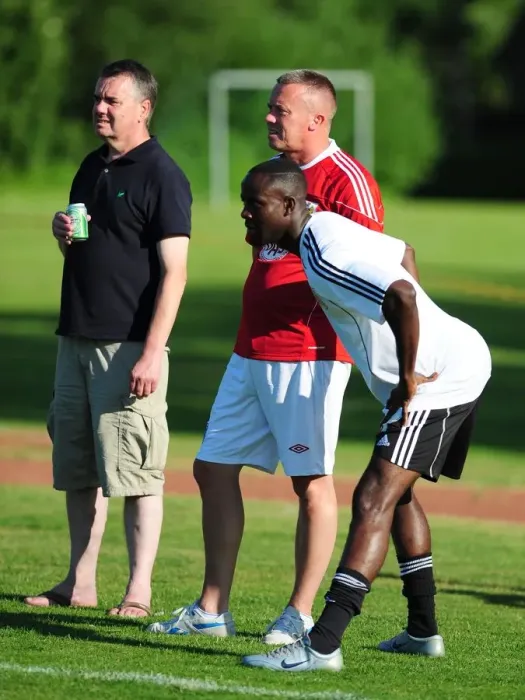 Framed Print : Bristol Citys Albert Adomah talks with fans while warming up Framed Print : Bristol Citys Albert Adomah talks with fans while warming up