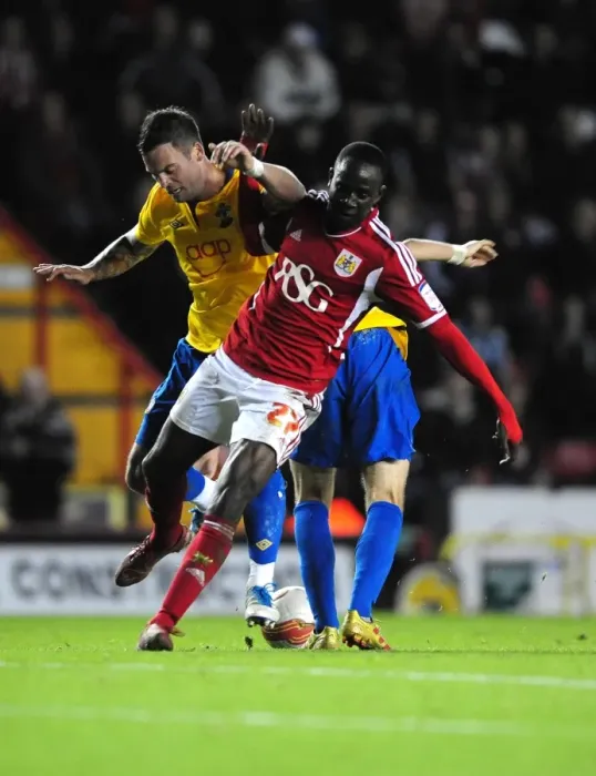 Framed Print : Bristol City's Albert Adomah vs. Danny Fox in Championship Clash at Ashton Gate Stadium (November 26, 2011) Framed Print : Bristol City's Albert Adomah vs. Danny Fox in Championship Clash at Ashton Gate Stadium (November 26, 2011)