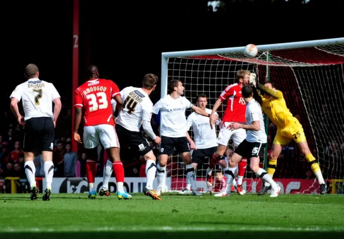 Framed Print : Bristol City's Andre Amougou Heads Shot Saved by Barnsley's David Button during Bristol City v Barnsley Match, Ashton Gate Stadium (Sports, Football) Framed Print : Bristol City's Andre Amougou Heads Shot Saved by Barnsley's David Button during Bristol City v Barnsley Match, Ashton Gate Stadium (Sports, Football)