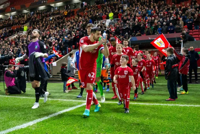 Framed Print : Bristol City's Bailey Wright Leads Team Charge Against Sheffield Wednesday in Sky Bet Championship
