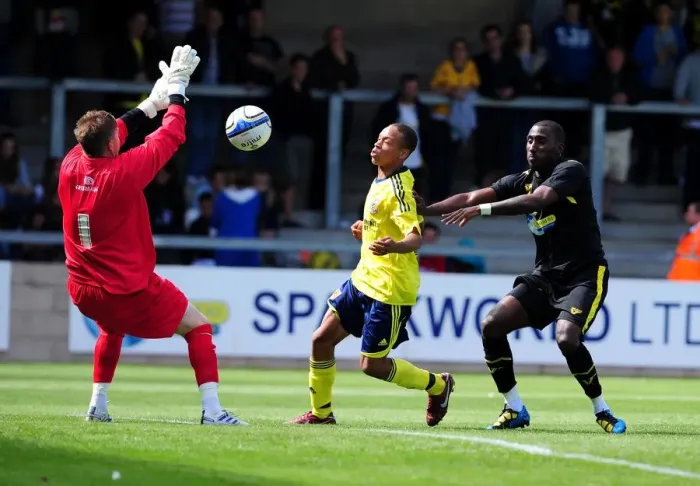 Framed Print : Bristol City's Bobby Reid Leaps to Clear the Bar, but Just Short (Torquay vs. Bristol City)