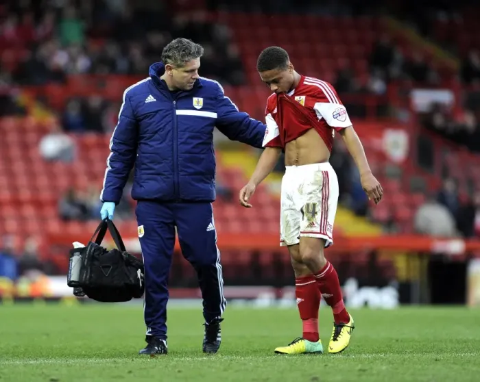 Framed Print : Bristol City's Bobby Reid Substituted with Injury vs Walsall (December 2013) Framed Print : Bristol City's Bobby Reid Substituted with Injury vs Walsall (December 2013)
