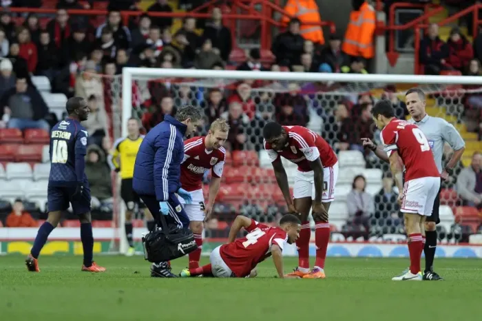 Framed Print : Bristol City's Bobby Reid Suffers Injury in Bristol City v Walsall Match, 26 / 12 / 2013