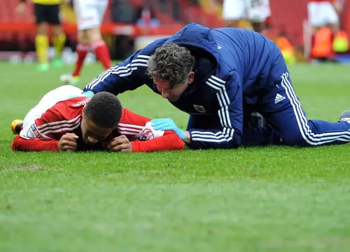 Framed Print : Bristol City's Bobby Reid Suffers Injury During FA Cup Match Against Watford Framed Print : Bristol City's Bobby Reid Suffers Injury During FA Cup Match Against Watford