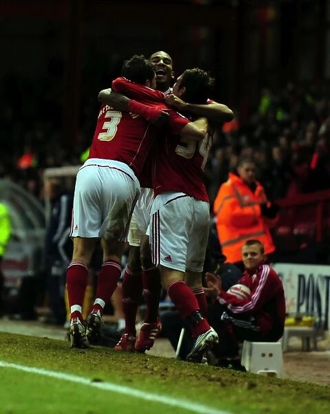 Bristol City's Brett Pitman Celebrates Championship Goal with Team Mates vs. Derby County (11-12-2010)