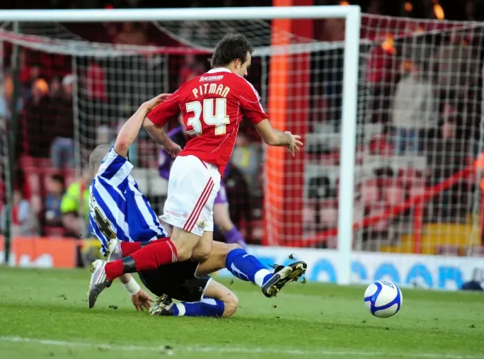 Framed Print : Bristol City's Brett Pitman Fouled by Darren Purse in FA Cup Match vs. Sheffield Wednesday Framed Print : Bristol City's Brett Pitman Fouled by Darren Purse in FA Cup Match vs. Sheffield Wednesday