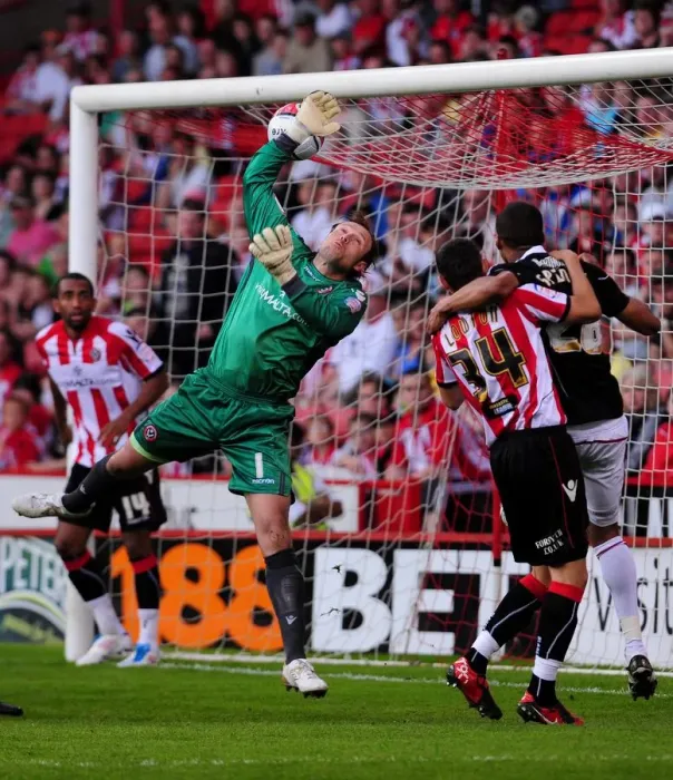 Framed Print : Bristol City's Brett Pitman Scores Own Goal Against Sheffield United's Steve Simonsen - Championship Match, 23rd April 2011 Framed Print : Bristol City's Brett Pitman Scores Own Goal Against Sheffield United's Steve Simonsen - Championship Match, 23rd April 2011