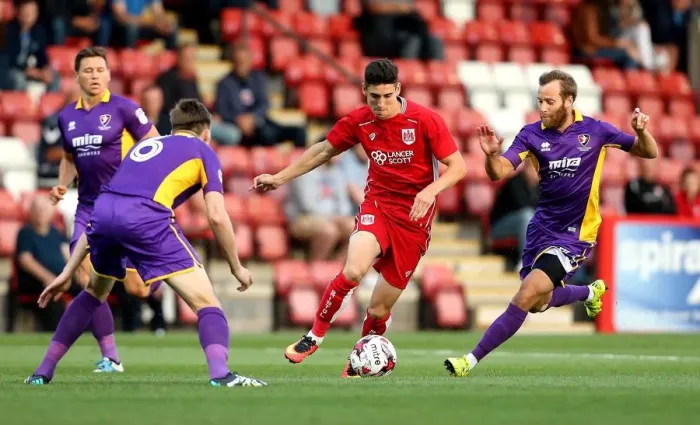 Framed Print : Bristol City's Callum O'Dowda Dashes Past Cheltenham Town's James Dayton in Preseason Friendly Framed Print : Bristol City's Callum O'Dowda Dashes Past Cheltenham Town's James Dayton in Preseason Friendly