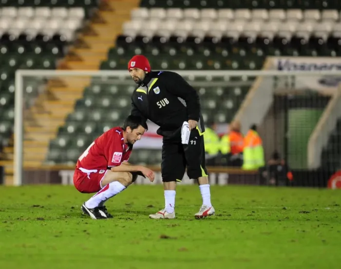Framed Print : Bristol City's Cole Skuse and Paul Hartley: A Moment of Consolation at the Final Whistle (Plymouth Argyle vs. Bristol City, March 16, 2010)