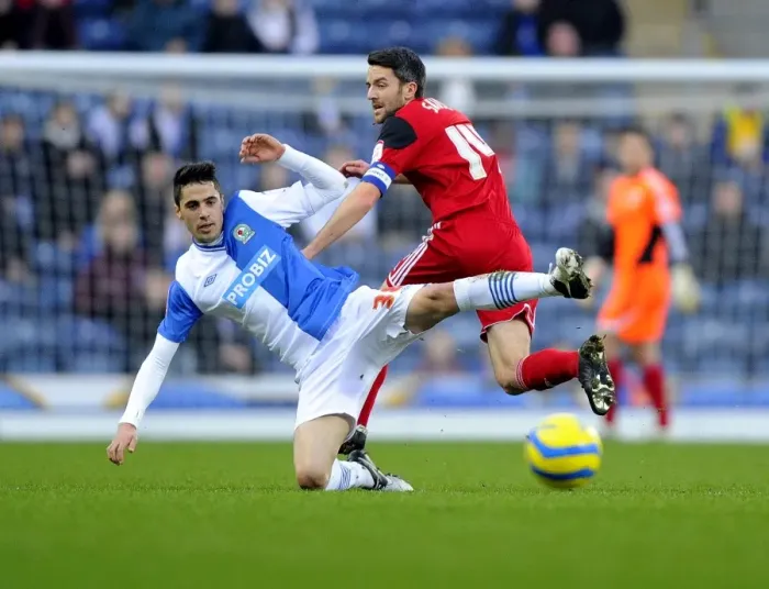 Framed Print : Bristol City's Cole Skuse Tackles Diogo Rosado in FA Cup Clash at Ewood Park