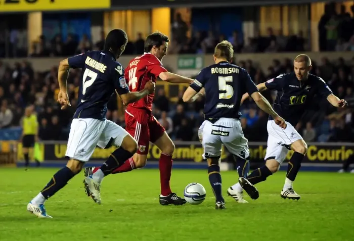 Framed Print : Bristol City's Cole Skuse Tackles Millwall's Defense - Championship Clash, April 2011